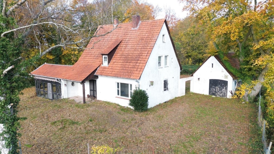 Einfamilienhaus - Bestandsimmobilie mit großem Gestaltungsspielraum, bereit für Ihre Vision