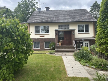 Einfamilienhaus mit Einliegerwohnung in Waldrandlage, ideale Kombination aus Wohnen und Rendite, 31595 Steyerberg, Einfamilienhaus